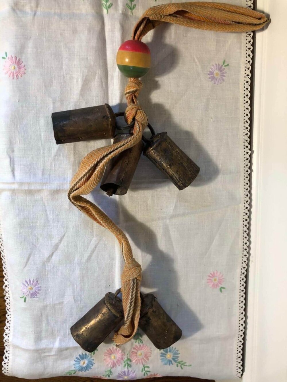 Hanging cow bells wall art